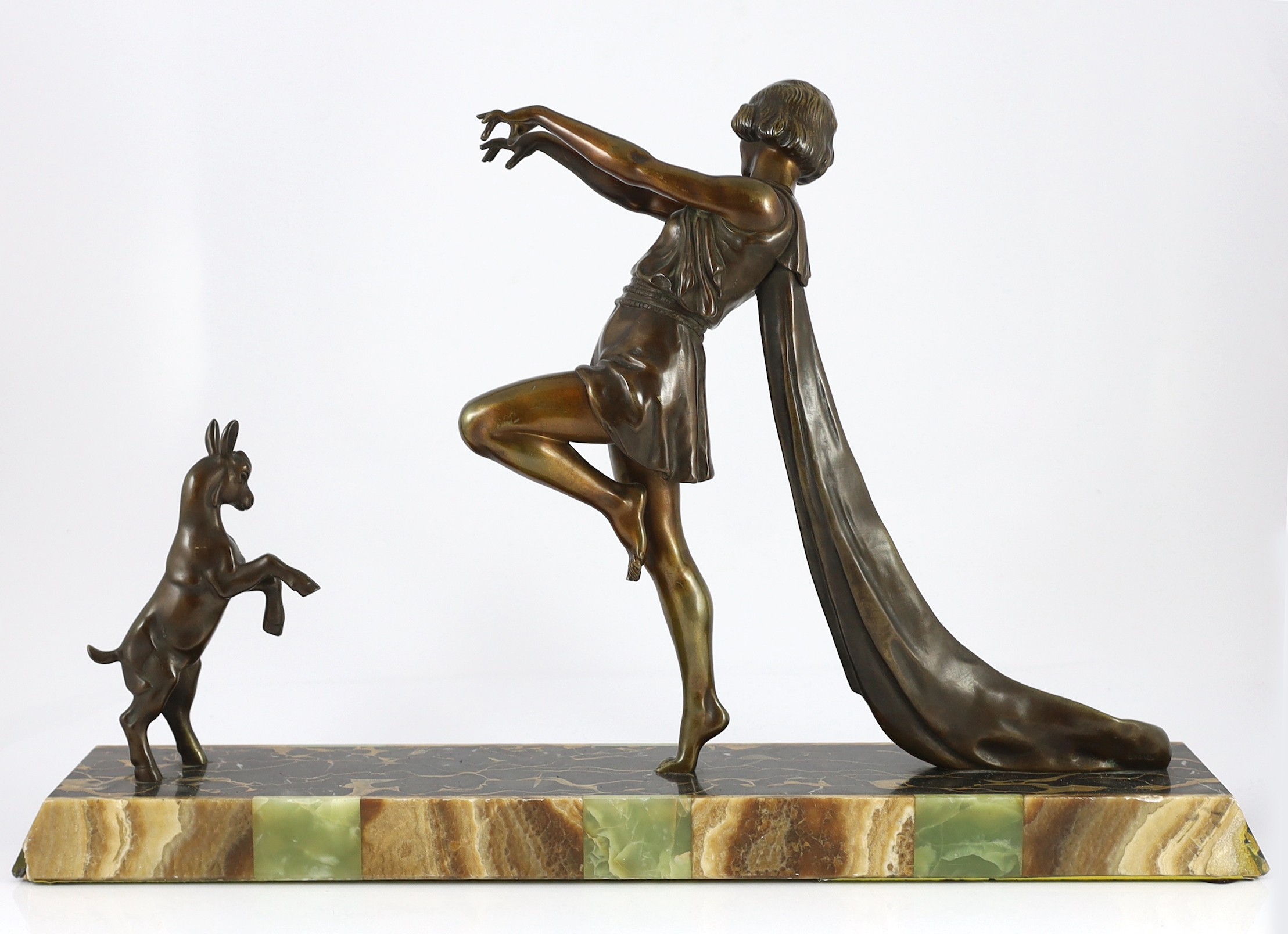 Emile Carlier. A French Art Deco bronze and marble group of a toga dancer with a kid, 71cm wide, 46cm high